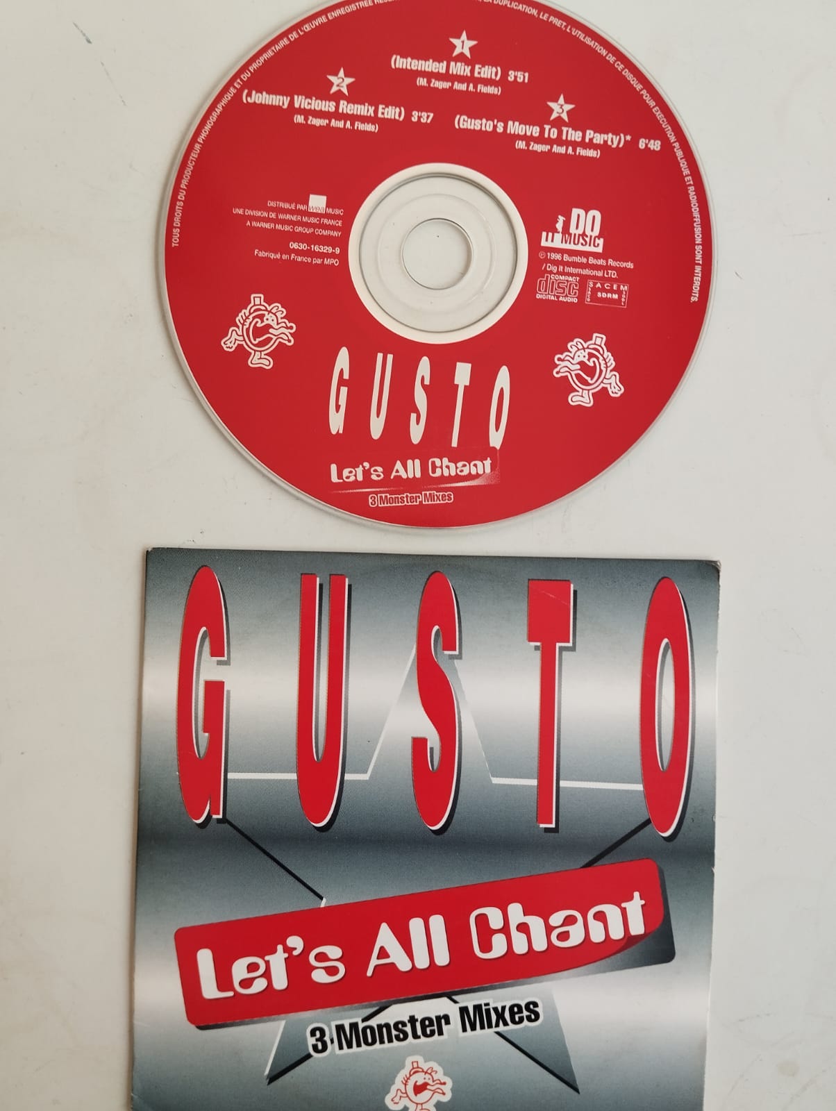 Gusto – Let’s All Chant (3 Monster Mixes) - 1996  Avrupa Basım 2. El CD, Single, Cardboard Sleeve