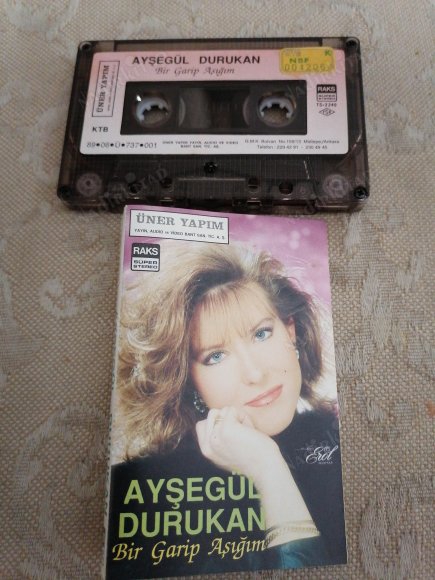 AYŞEGÜL DURUKAN  / BİR GARİP AŞIĞIM  /  1989  TÜRKİYE    BASIM ( KASET ) KAĞITLI