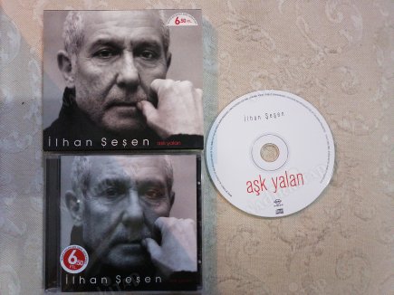 İLHAN ŞEŞEN - AŞK YALAN  - 2005  TÜRKİYE  BASIM CD ALBÜM