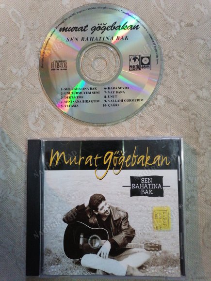 MURAT GÖĞEBAKAN - SEN RAHATINA BAK - 1998  TÜRKİYE  BASIM CD ALBÜM - ( SARI BANDROL PRESTİJ MÜZİK  )