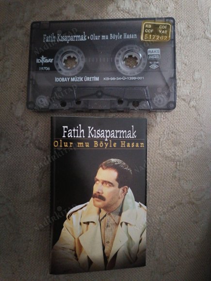 FATİH KISAPARMAK - OLUR MU BÖYLE HASAN   -1998  TÜRKİYE BASIM  *KASET*