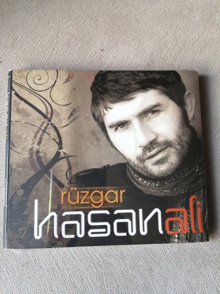 HASAN ALİ - RÜZGAR - TÜRKİYE BASIM  CD ALBÜM - AÇILMAMIŞ AMBALAJINDA