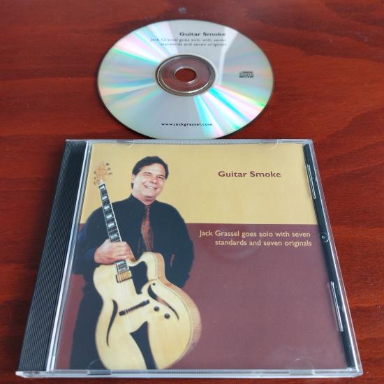 Guitar Smoke / Jack Grassel goes solo with seven standards and seven originals  - Yurtdışı Basım -  2. El CD  Albüm