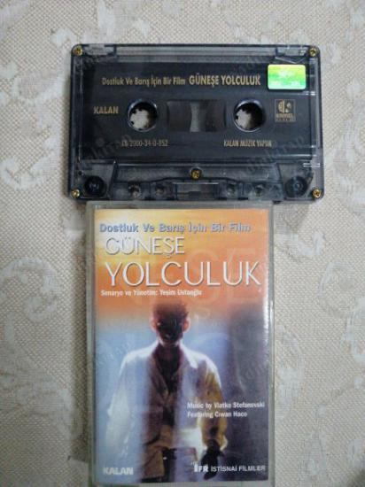 GÜNEŞE YOLCULUK -FİLM MÜZİKLERİ   2000  TÜRKİYE BASIM  (KASET)