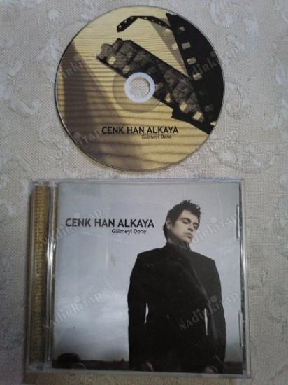 CENK HAN ALKAYA - GÜLMEYİ DENE   TÜRKİYE BASIM -   CD ALBÜM