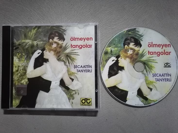 ŞECAATTİN TANYERLİ - ÖLMEYEN TANGOLAR - 2000 TÜRKİYE BASIM ALBUM CD